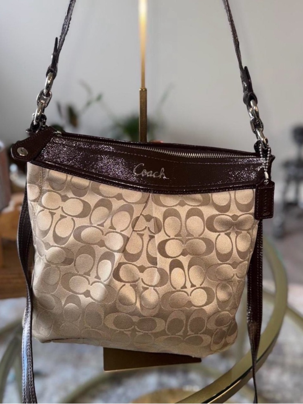Coach Ashley Signature Hippie convertible shoulder bag in khaki and mahogany.